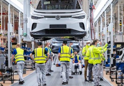 VW slams production into reverse as industry faces battles on all sides